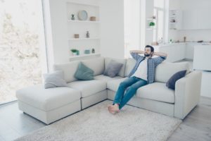 Man enjoying whole house air cleaner