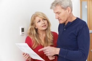 empty-nesters looking at bills
